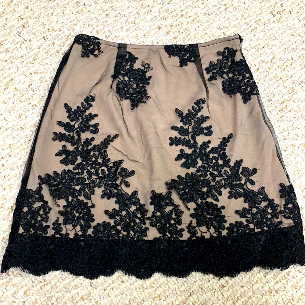 Black lace mini skirt